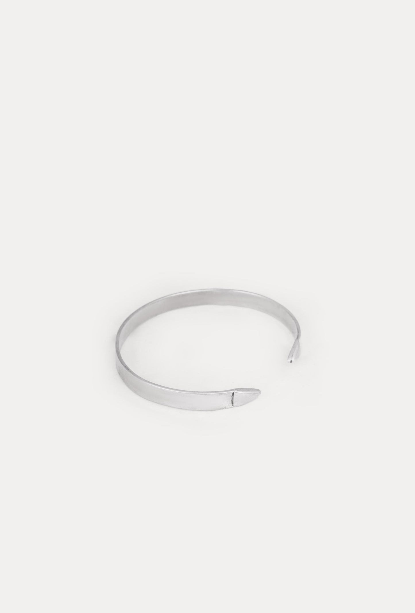 Handcrafted sterling silver half wheel bracelet